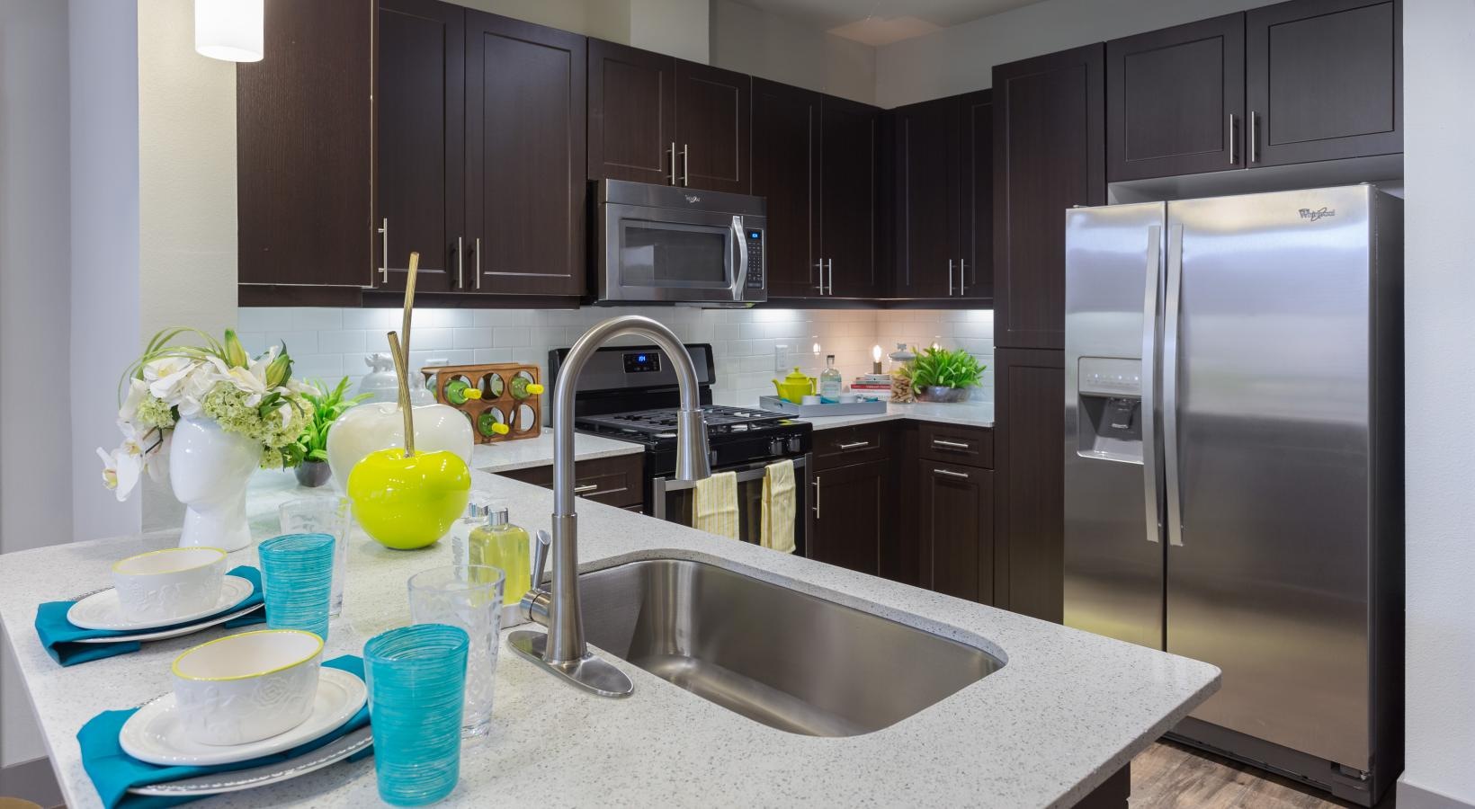Beautiful kitchens with designer finishes a kitchen with an island