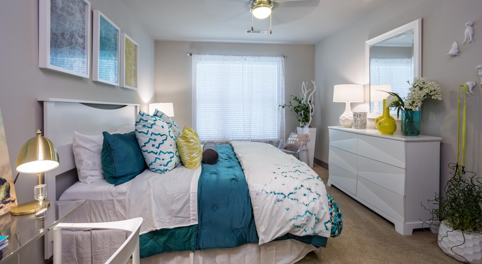 Bedroom options to fit every lifestyle bedroom with a bed and ceiling fan