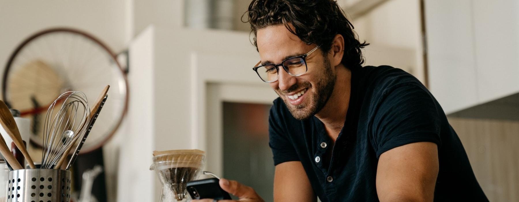 a man holding a phone