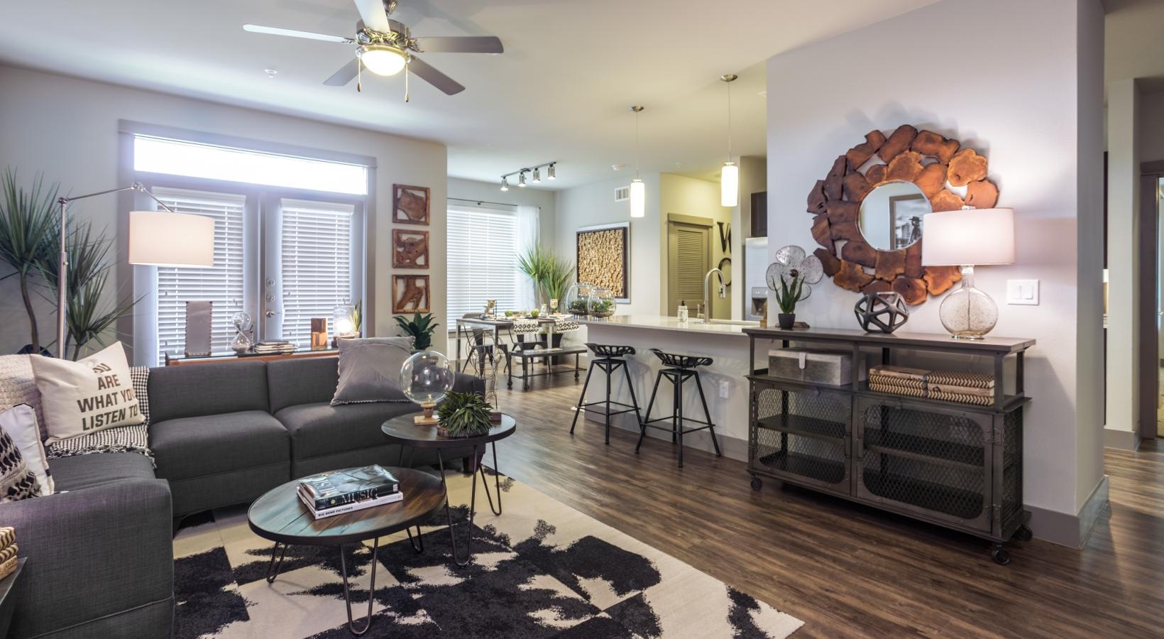 Spacious living areas to recline and recharge a living room open to kitchen