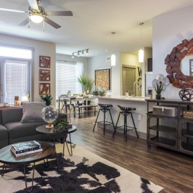 Spacious living areas to recline and recharge a living room open to kitchen