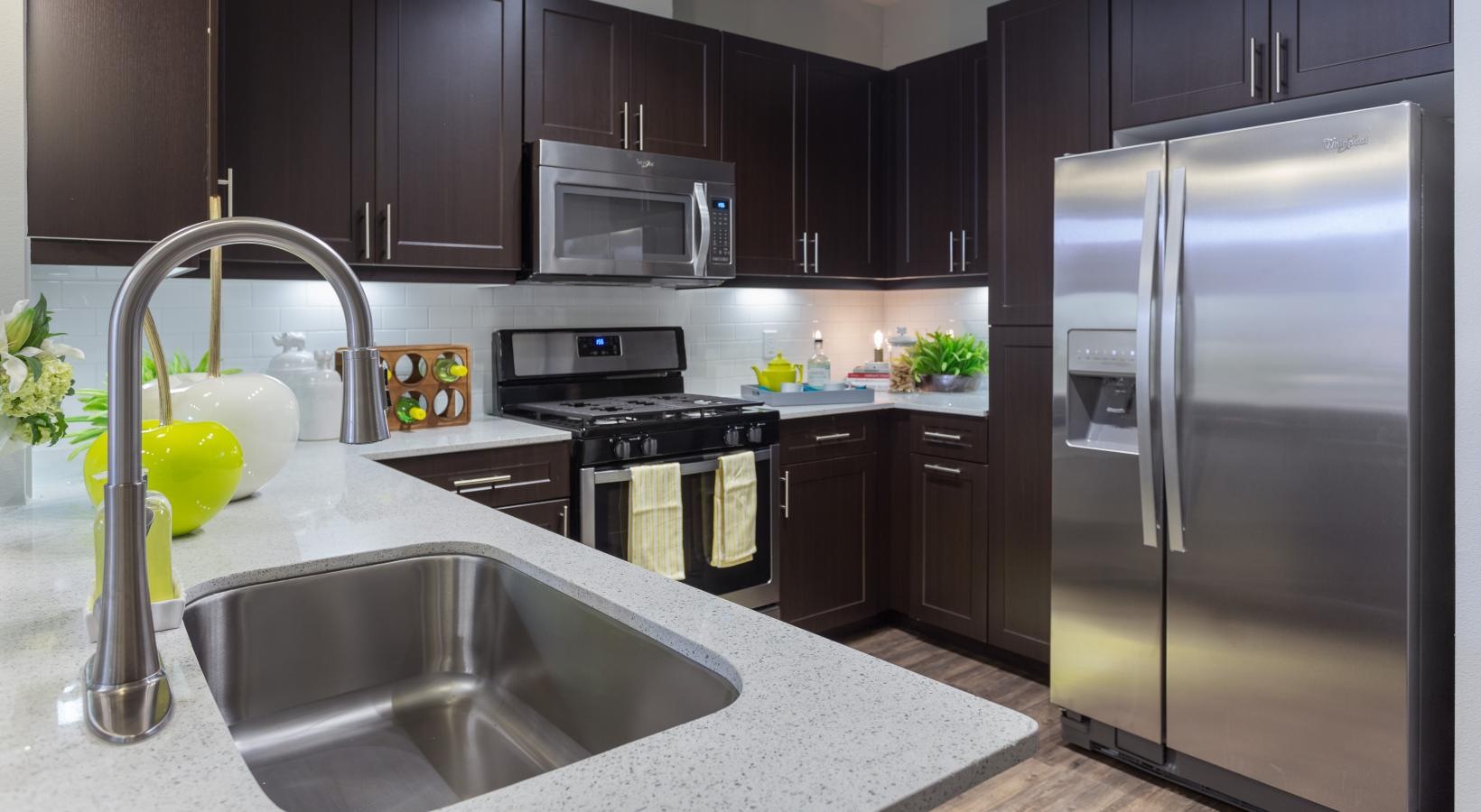 Beautiful kitchens with designer finishes recessed lighting in c-shaped kitchen
