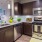a kitchen with dark wood cabinets