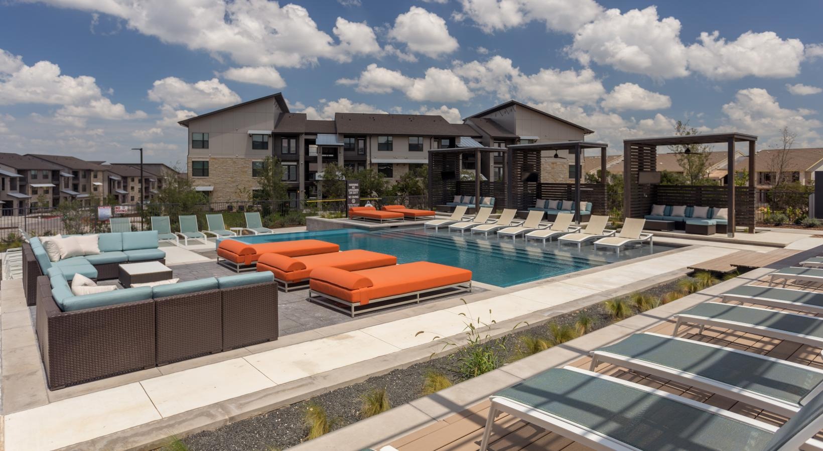 Sparkling swimming pool swimming pool with tanning deck