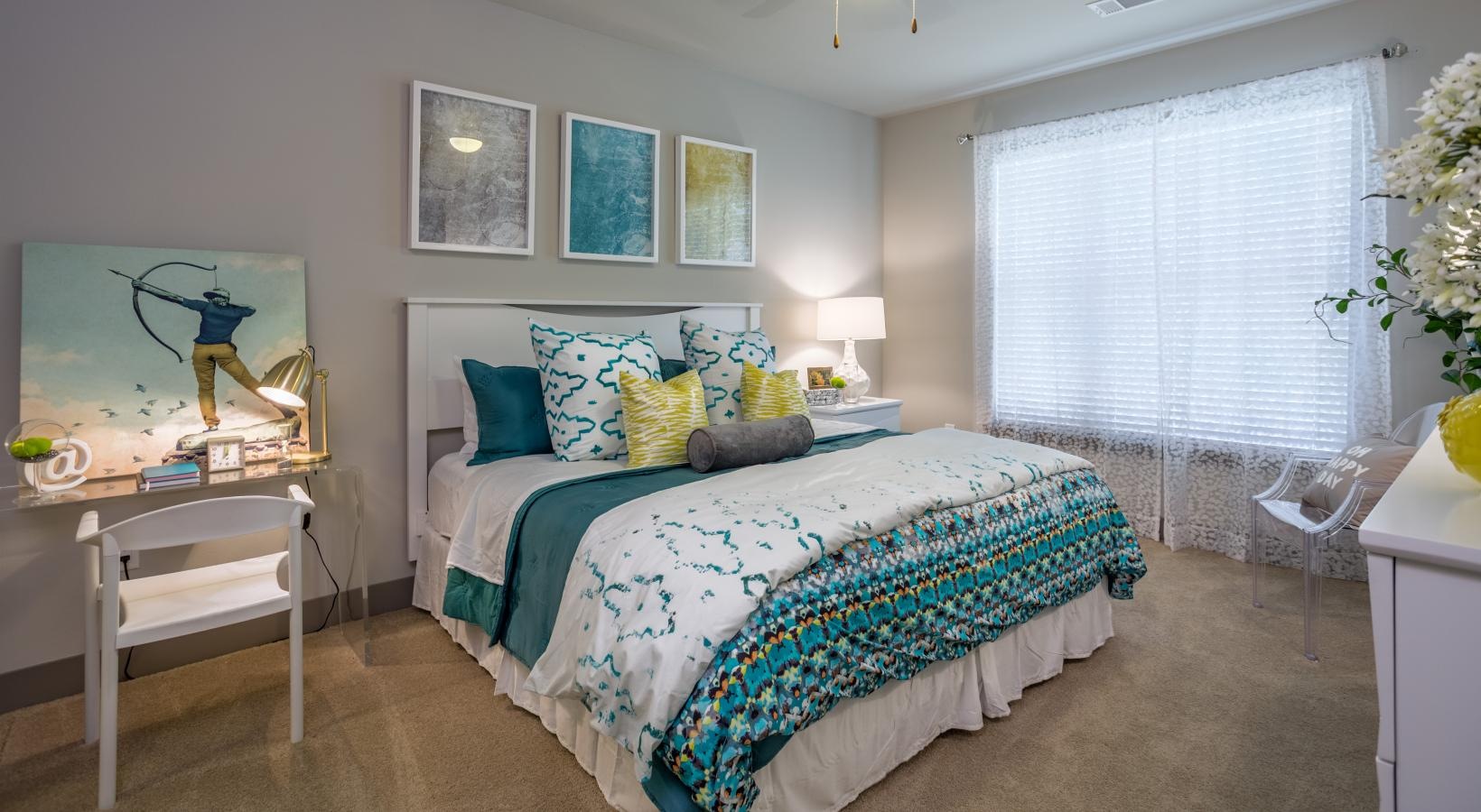 Sleep in style a bedroom with a bed and a chair