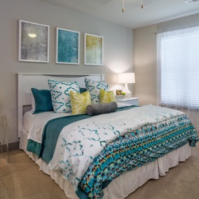 Sleep in style a bedroom with a bed and a chair