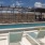 a pool with chairs around it